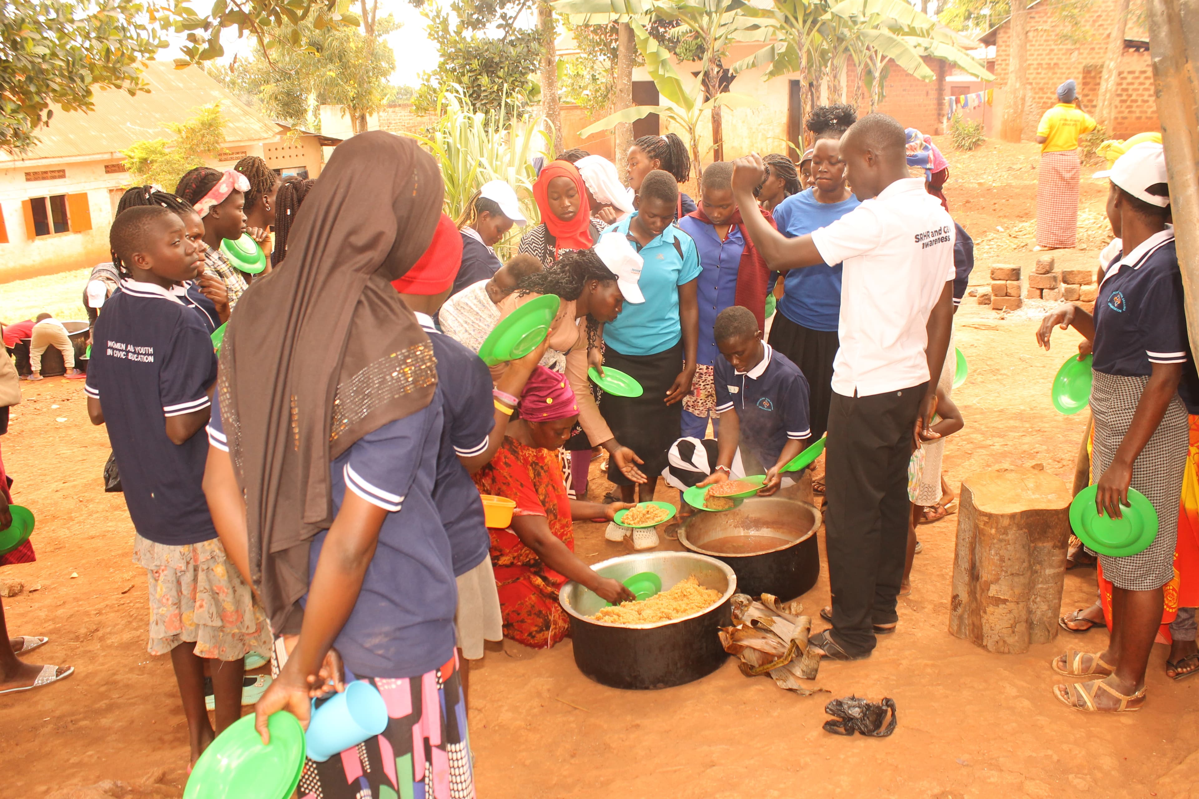 In the rural areas of Mpigi having a luch break