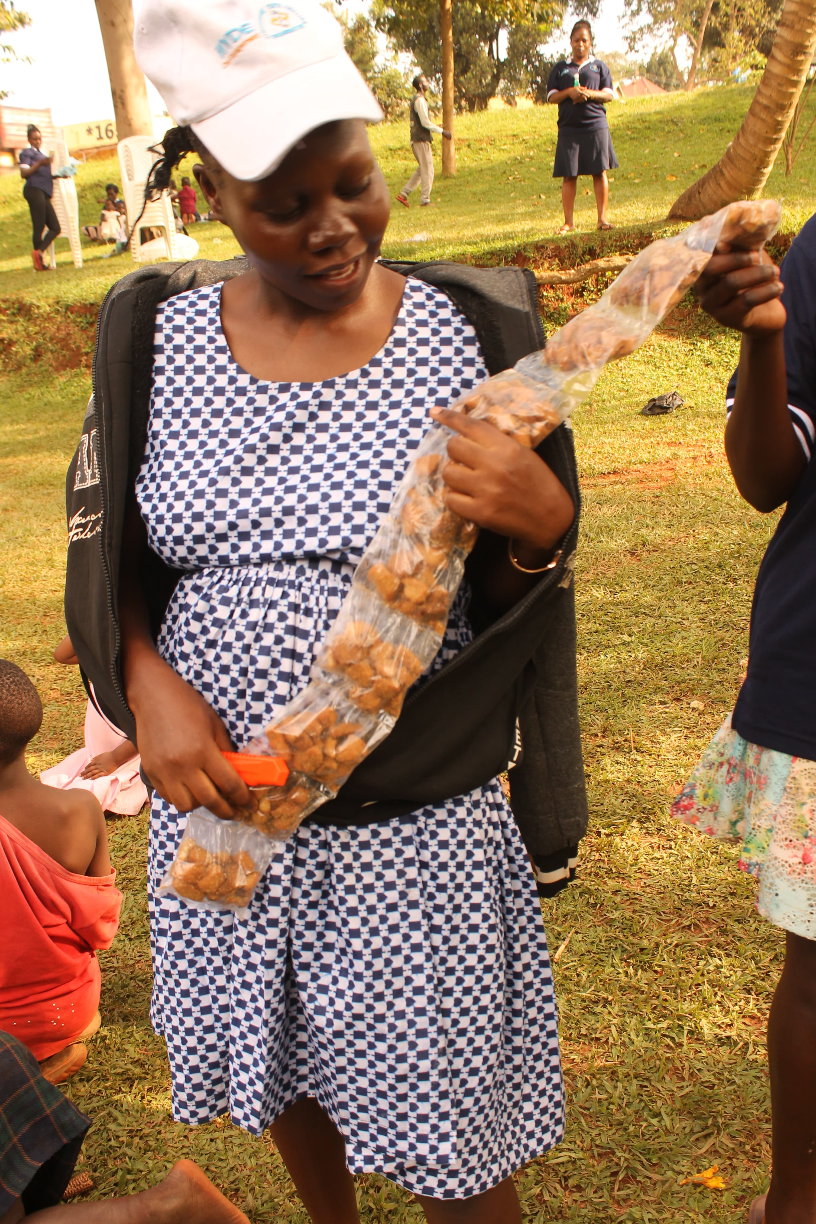 One of the trainees with the snacks she learnt to make