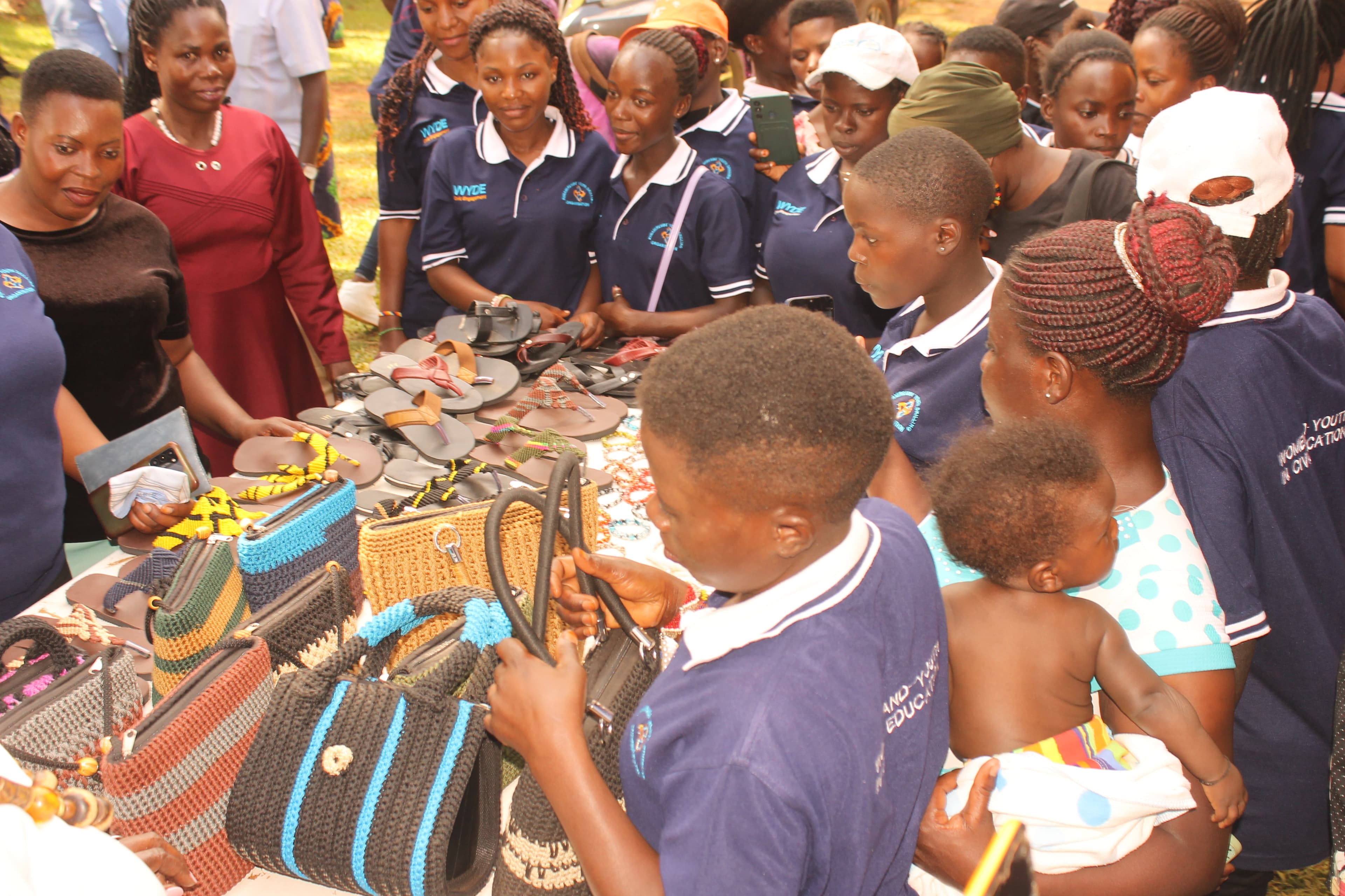 Trainees with some of their exhibits on the exhibition day